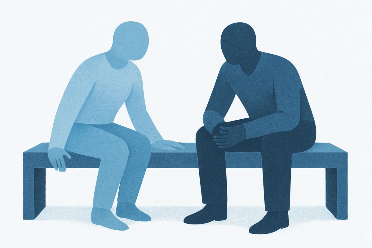 Illustration of two adults on a bench leaning toward each other, in soft blue tones